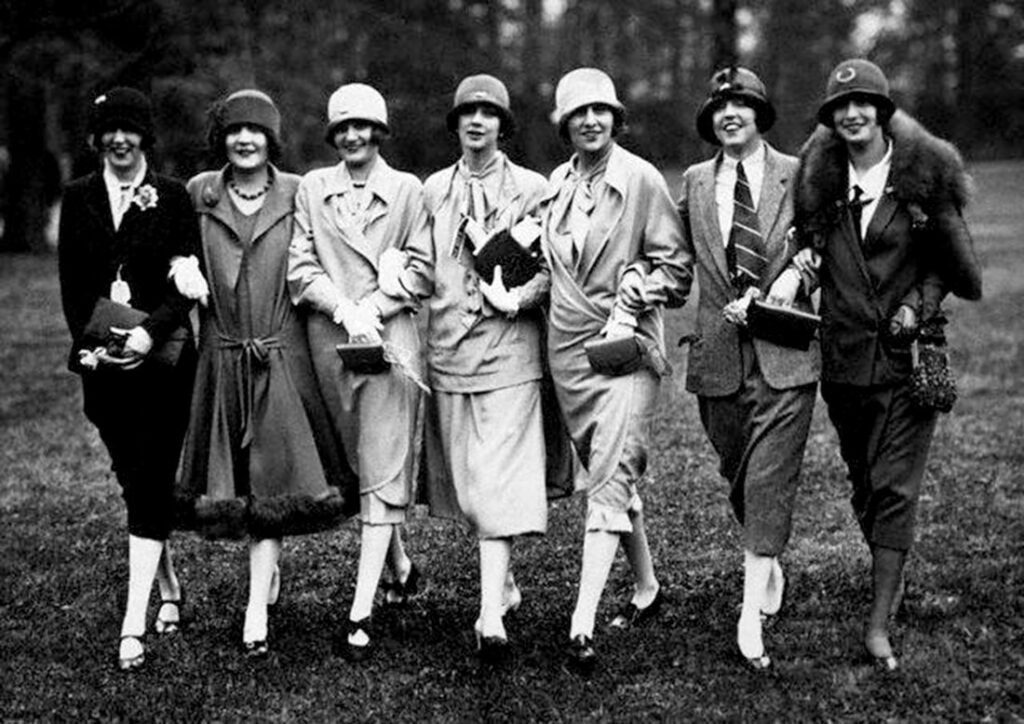 Fashion Icons of the 1920s Fashion Trends for Women,1920s fashion trends for women flapper dress style,Vintage flapper girl with pearl necklace and headband,Drop waist dress 1920s fashion for women,Cloche hat and bob haircut 1920s outfit,Sequined evening dress 1920s vintage glamour, girly times